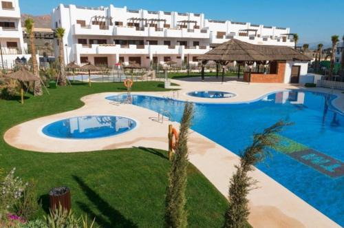 Mar de Pulpi Apartment | Discover Chez Titi: Poolside Escape with 10/10 Ratings