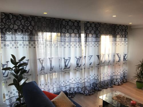 Quartier du Vieux-Pont - Sainte-Genevieve Apartment | Elegant Stay at ChezClervie Near Paris La Défense Arena