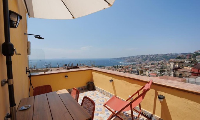Vittorio Emanuele Apartment | Cozy Chiaia Sea View Studio with Double Terrace Awaits