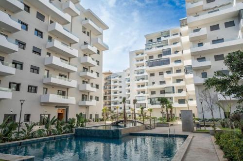 Ain Harrouda Apartment | Chic 2 chambres balcon vue panoramique et piscine