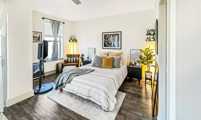 Frisco Square Apartment | Chic and Comfy Exec Retreat ~ 5-Star Location, Pool, Gym, Parking, EV Charging!