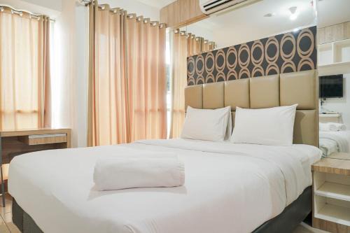 Kayu Putih Apartment | Cozy Studio Retreat at Tifolia Apartment with Pool Access