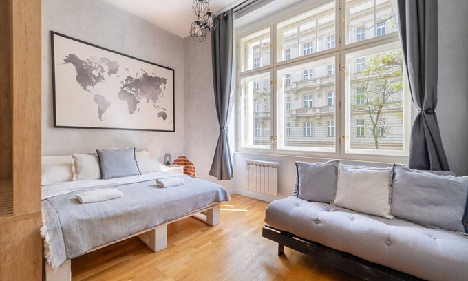 Nove Mesto Apartment | Chic Brick Suite in Historic City