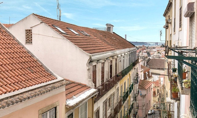 Bairro Alto Apartment | Stylish Citrus Retreat with Private Garden for Families