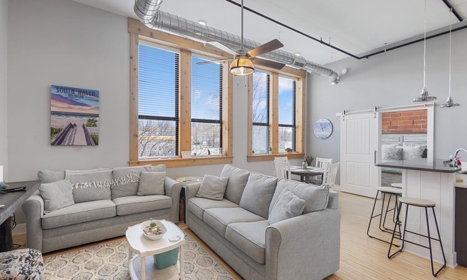 South Haven Condo | Discover Chic Downtown Loft with Pool & Hot Tub in South Haven