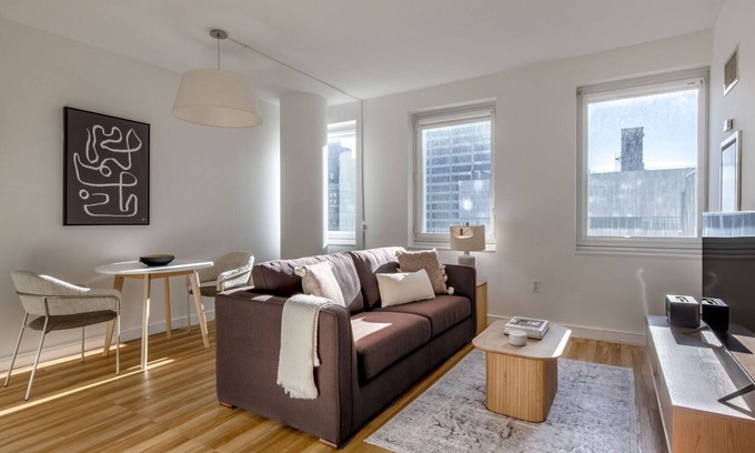 Central New York City Apartment | Stylish Midtown West 1BR with Doorman near Rockefeller Center