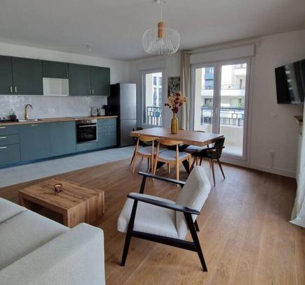 Zone d'amenagement concerte des Docks Apartment | Stylish 3-Bedroom Retreat with Balcony & Child-Friendly Fun