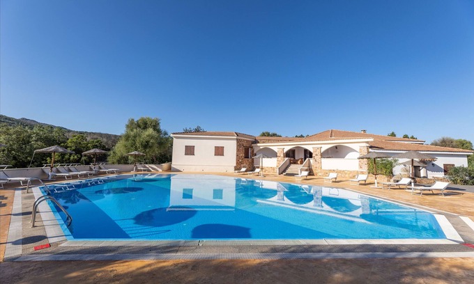 Golfo di Marinella Apartment | Elegant Villa Antonina One Bedroom with Pool & Spa
