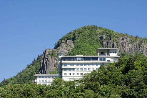 Kamikawa Hotel | Choyo Tei: Family-Friendly Retreat with Hot Tub & Dining