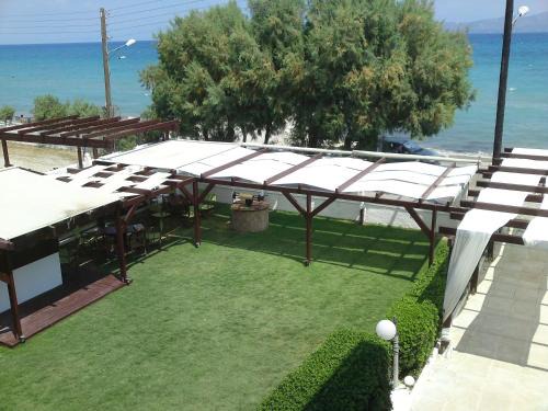 Assos-Lechaio Apartment | Oceanfront Chris Studios & Apartments with Child-Friendly Perks