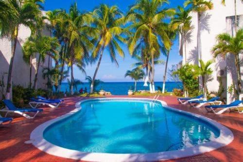 Tower Isle Apartment | Beachfront Retreat at Chrisanns Paradiso - Pet Friendly Stay