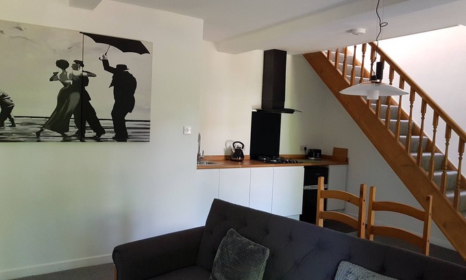 Ainley Top Apartment | Discover Church View: Central Lindley with Kitchen Amenities