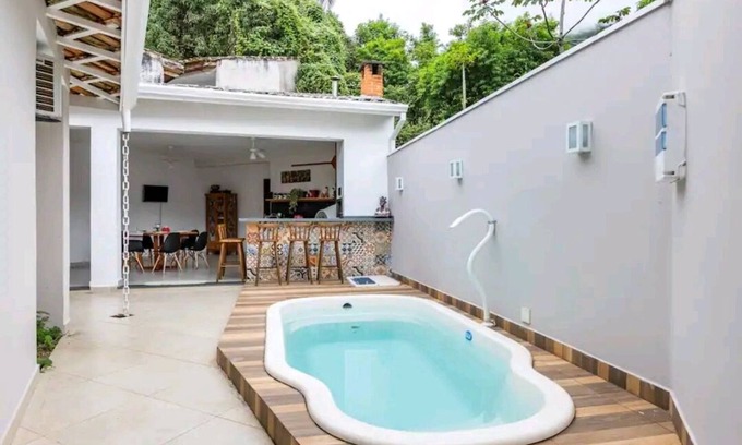 Praia das Cigarras House | Explore Cigarêrê - Season São Sebastião with Pet-Friendly Perks
