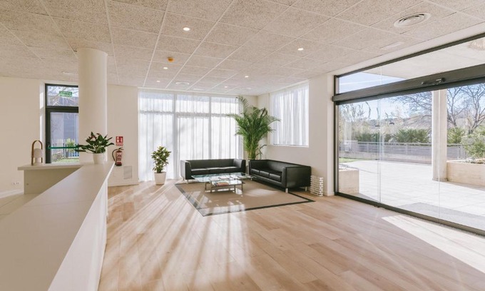 Sant Cugat del Valles Apartment | Discover CIM Aparthotel: 4-Star Stay with Pool Access