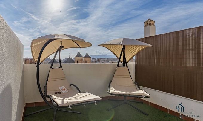 San Felipe Neri Apartment | Experience City Views from Living4malaga's Inviting Terrace