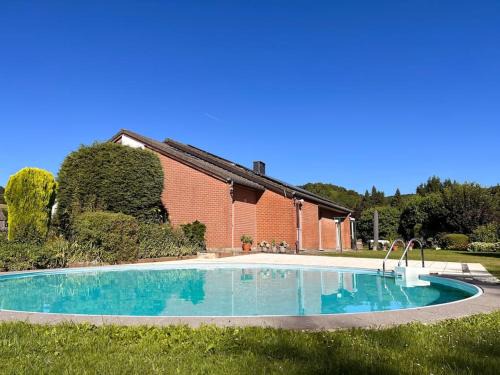 Theux Apartment | Discover Clémentine: Oceanfront Bliss with Pool Access