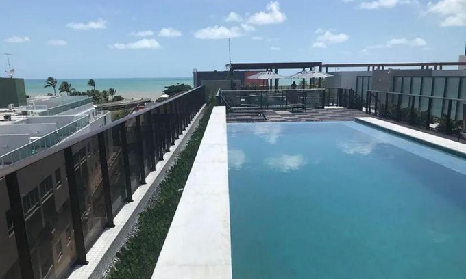 Tambau Apartment | Pet-Friendly Eco Duplex 514 with Ocean Views & Pool