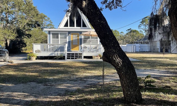 Panacea House | Seaside A-Frame Retreat with Ocean View and Pet-Friendly Perks