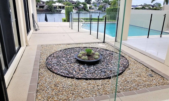 Helensvale House | Elegant Waterfront Retreat with Free Theme Park Access