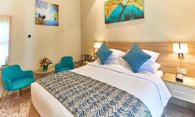 Al Barsha 1 Apartment | Cozy Room Near Mall of Emirates with Kitchen Amenities