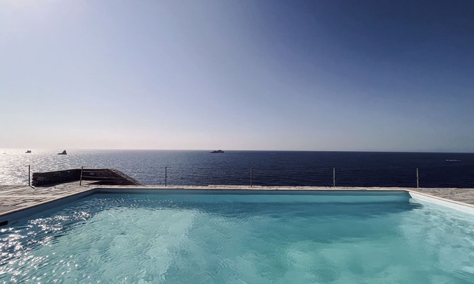 Parikia Villa | Cliff Villa Paros: Panoramic Ocean Views & Shared Pool