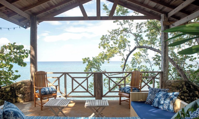 Orange Bay Villa | Cliffhouse Villa: Oceanfront Bliss with Pool & Snorkeling