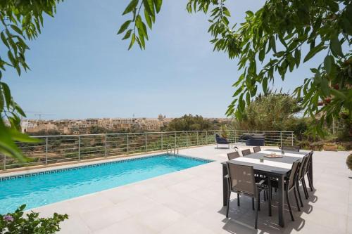 Xaghra Apartment | Oceanfront Clifftop Lodge with Pool and Pet-Friendly Stay