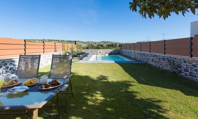 Houdetsi Villa | Beachside Getaway: 9.8 Rated with Pool & Family Amenities