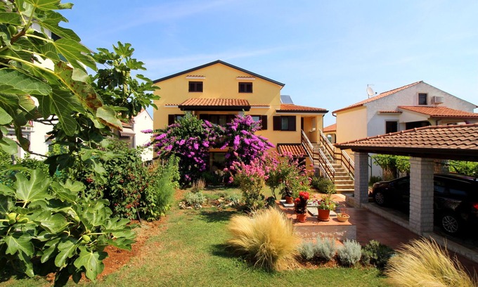 Brulo Apartment | Family-Friendly Retreat Steps from the Beach with Ocean View