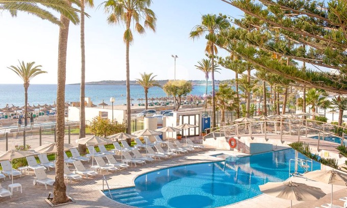 Sant Llorenc des Cardassar Hotel | Experience CM Playa del Moro: Oceanfront Bliss & Family Fun