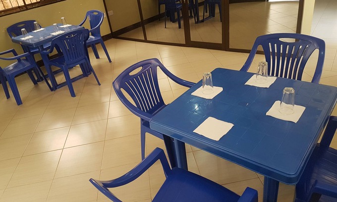 Arusha House | Co Msasani Guest House: Family-Friendly Stay with Dining