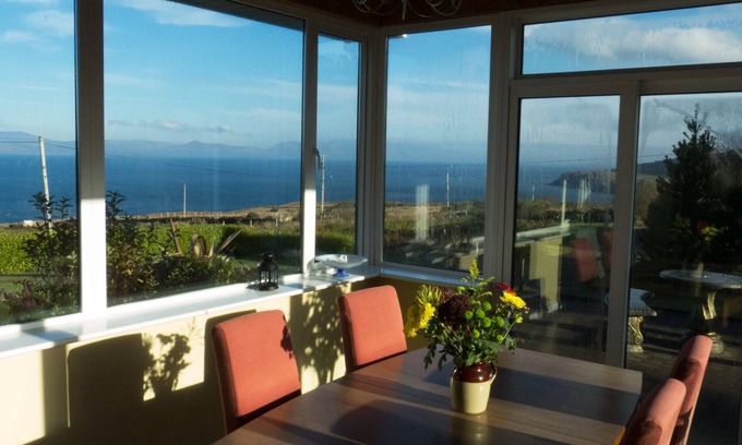 Kells House | Coastal Cottage in Kells: Oceanfront Retreat with Pool