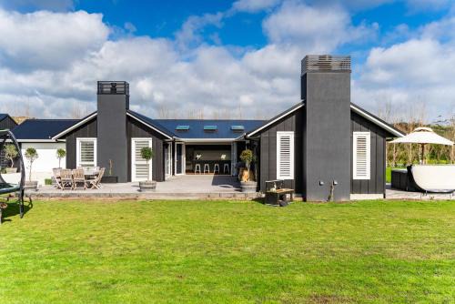 Mangawhai House | Pet-Friendly Coastal Country Retreat with Pool Access