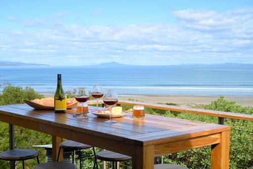 Coles Bay House | Oceanfront Coastal Escape with Hot Tub & Fireplace Awaits