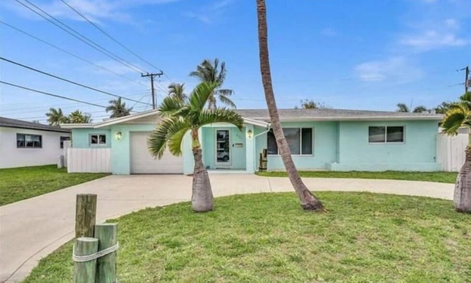 Garden Isles House | Coastal Gem: Relax by the Pool and Indulge in Luxury