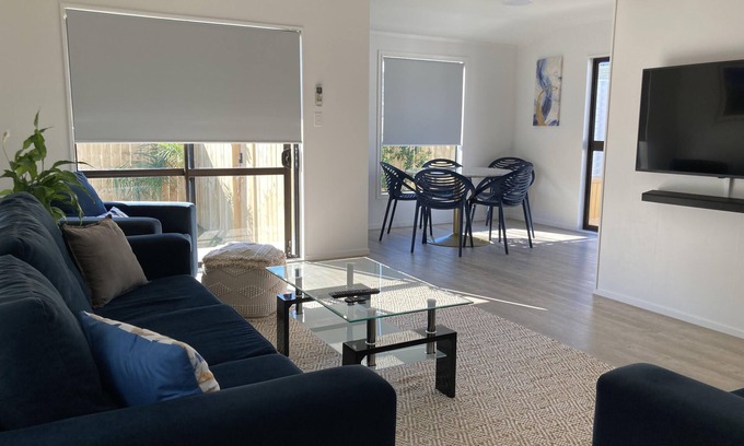 Papamoa Beach Cottage | Idyllic Beach Retreat with Private Spa & Ocean Views