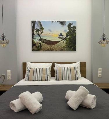 Vlachiana Apartment | Paradise Coastline Retreat with Oceanfront Views