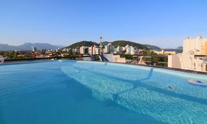 Guaratuba Apartment | Duplex Near the Sea with Pool and Ocean Views