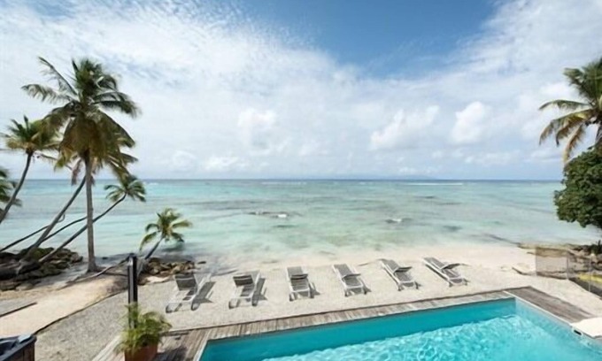 Grand-Bourg Apartment | Experience Coco Beach Resort with Oceanfront Pool Access
