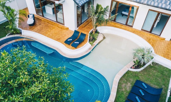 Wok Tum Resort | Guest Rated: Coco Lilly Villas with Oceanfront Pool Access