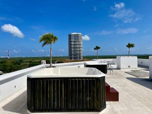 S.M. 57 Apartment | Indulge in the Coco Luxury Loft with Hot Tub Retreat