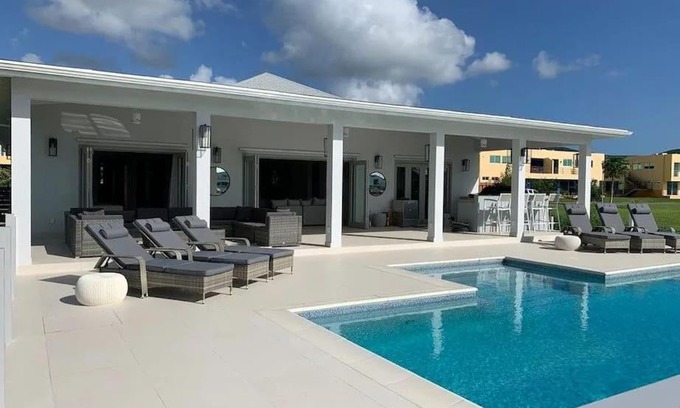 Jolly Harbour Villa | Coco Palms 4 Bedroom Villa with Pool & Dock by the Ocean