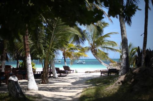 Galu Beach Apartment | Beachfront Escape at Coconut Village Beach Resort