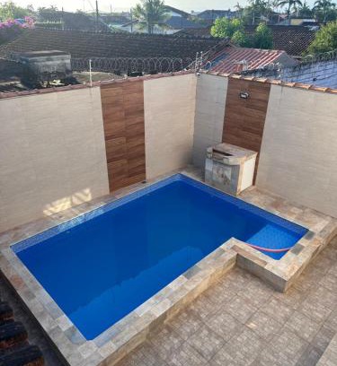 Itanhaem Apartment | Family-Friendly Getaway: Lindo Sobrado with Pool & Kids Area