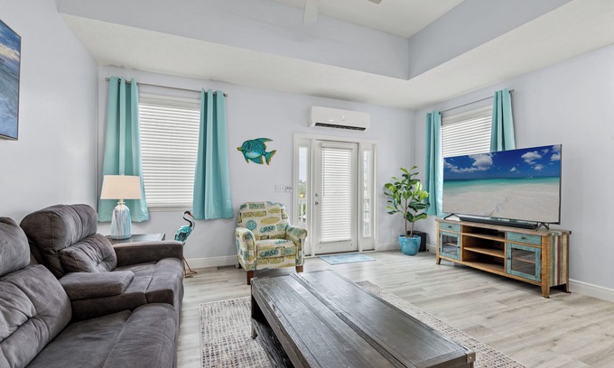 Holiday Beach House | Colorful Cottages! Luxuriously Updated, Pool, Just STEPS to the Beach!