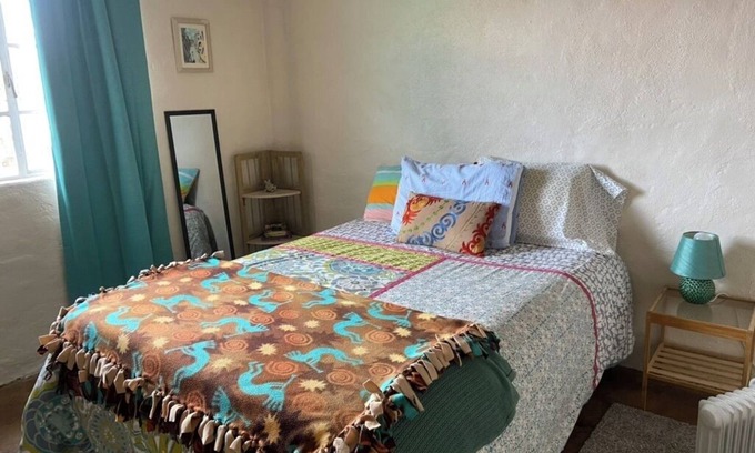 Tyrone House | Colorful & cozy adobe perched up in Chihuahua Hill with great views!