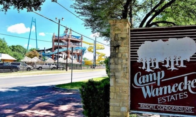 New Braunfels Condo | Comal River View 2BR Condo Steps to Schlitterbahn with Pool Sleeps8
