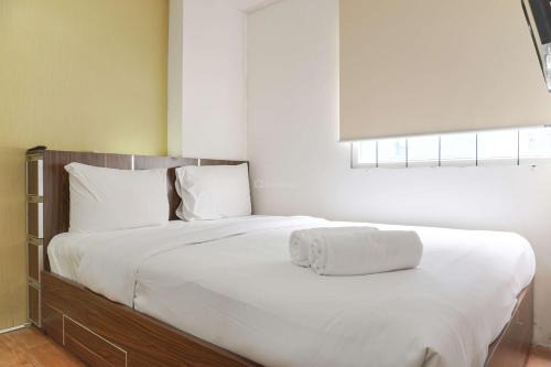 Rawasari Apartment | Spacious 3BR Apartment at Green Pramuka City by Travelio