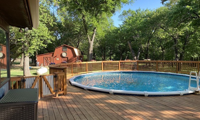 Pecan Acres Cabin | Discover Our Rustic Cabin with Trails & Top Amenities!