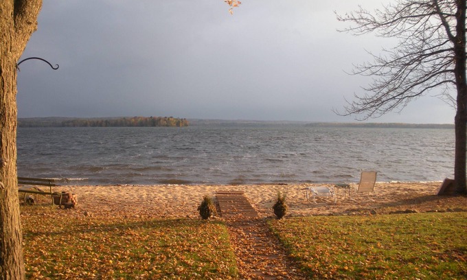 Interlochen House | Discover Serenity at Our Beachfront Cottage with Spa & Pool